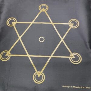 A black bag with gold colored star of david on it.