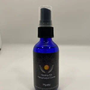 A bottle of aromatherapy oil sitting on top of a counter.