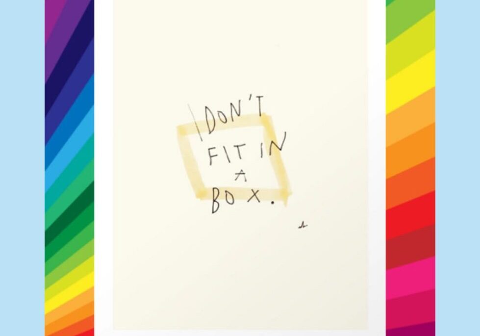 A picture frame with the words " don 't fit in a box ".